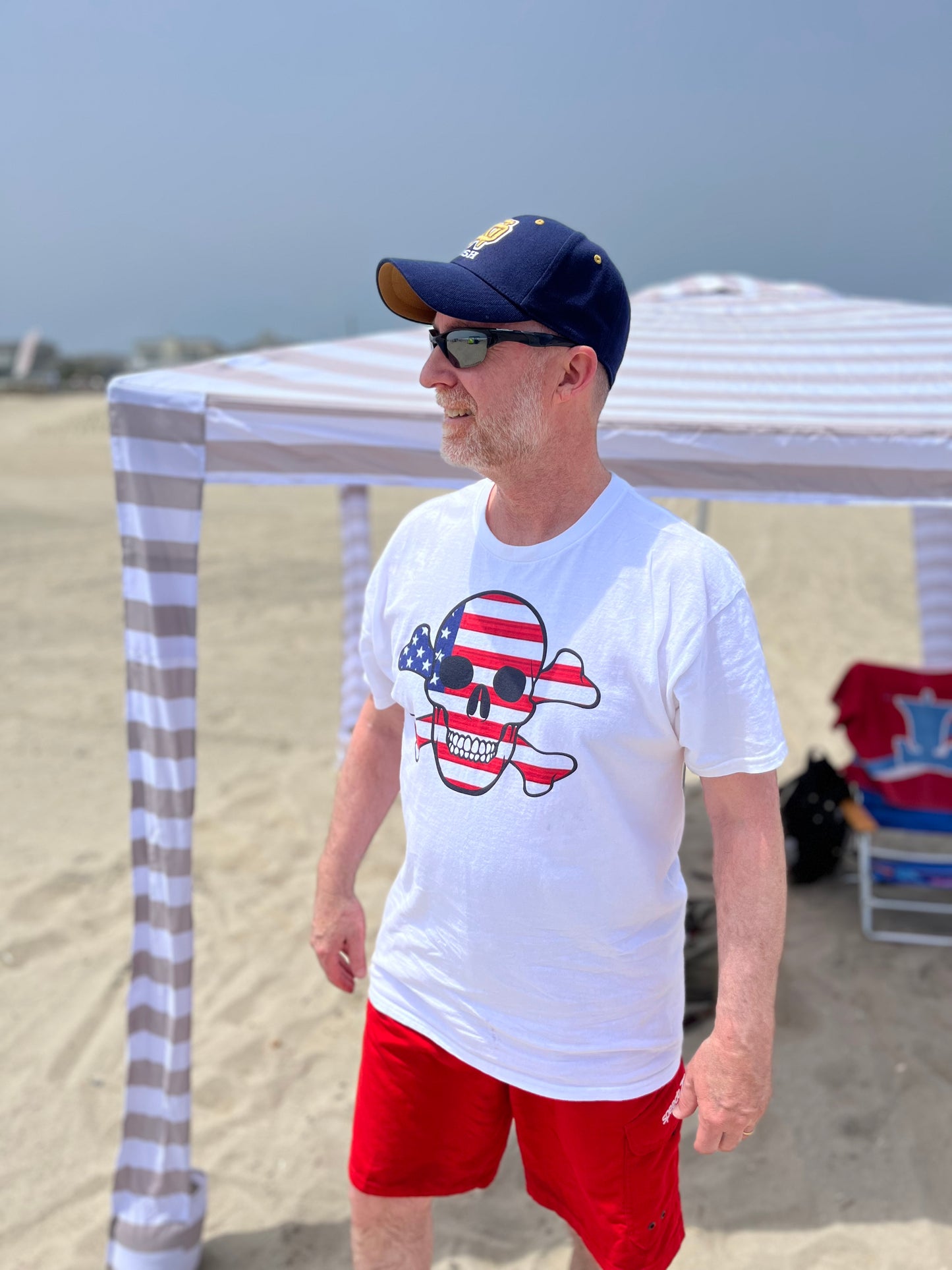 Unisex classic tee with the Flag of the United States in a Skull and Crossbones design!
