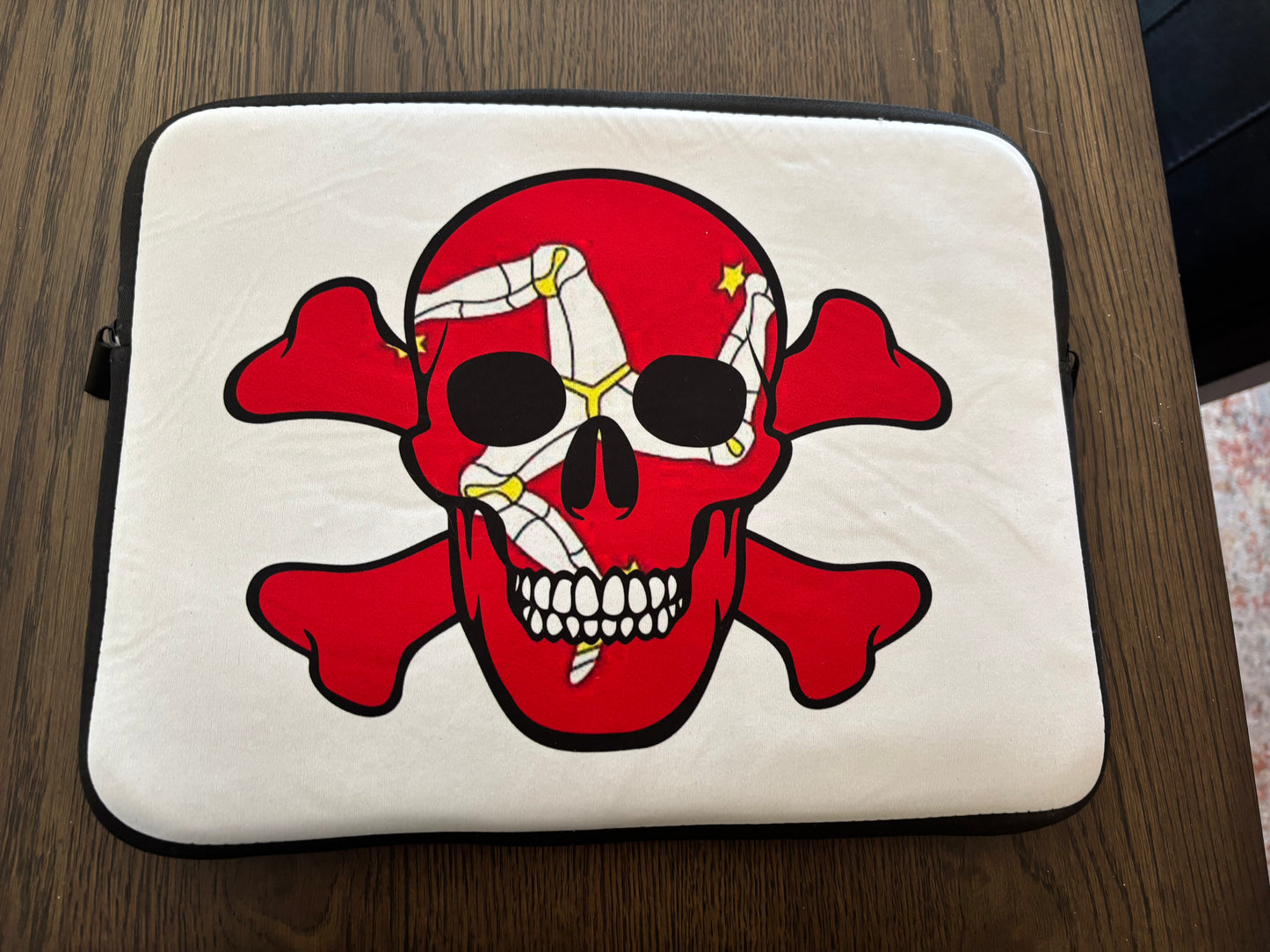 Laptop Sleeve with the Flag of The Isle of Man in a Skull and Crossbones design!